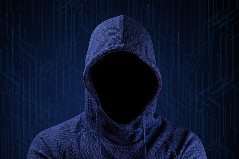 computer hacker blue sweatshirt hood on